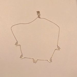 gold necklace with butterflies